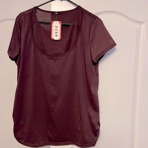 2 Maternity/ nursing shirts. 1 purple, 1 black.